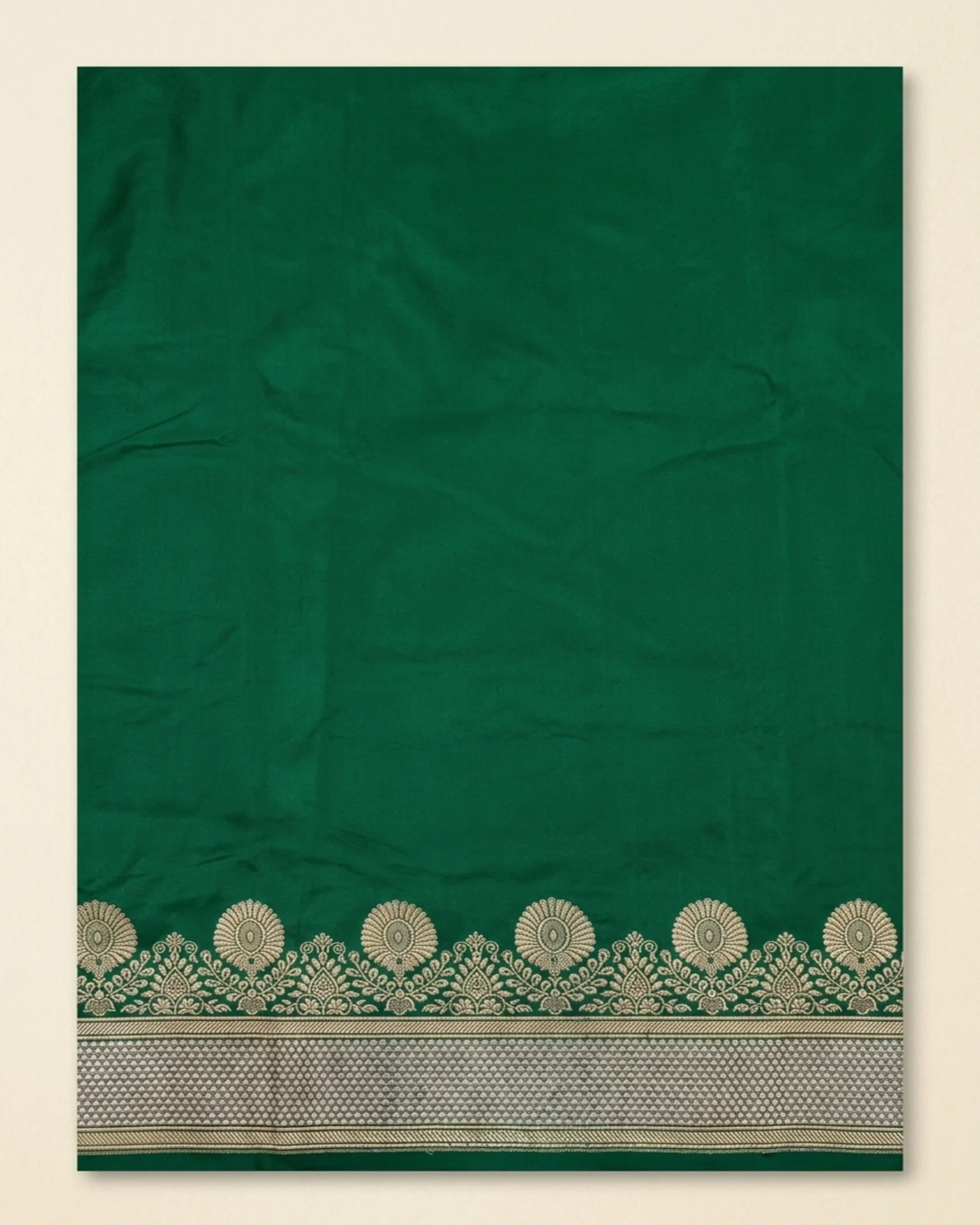 Matching Emerald Green unstitched blouse piece with woven Silver Zari border