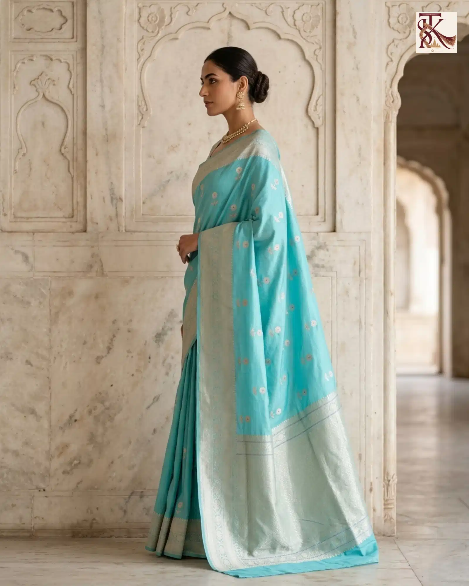Vibrant Turquoise Blue Katan Silk Kadwa Buti Banarasi Saree side profile view