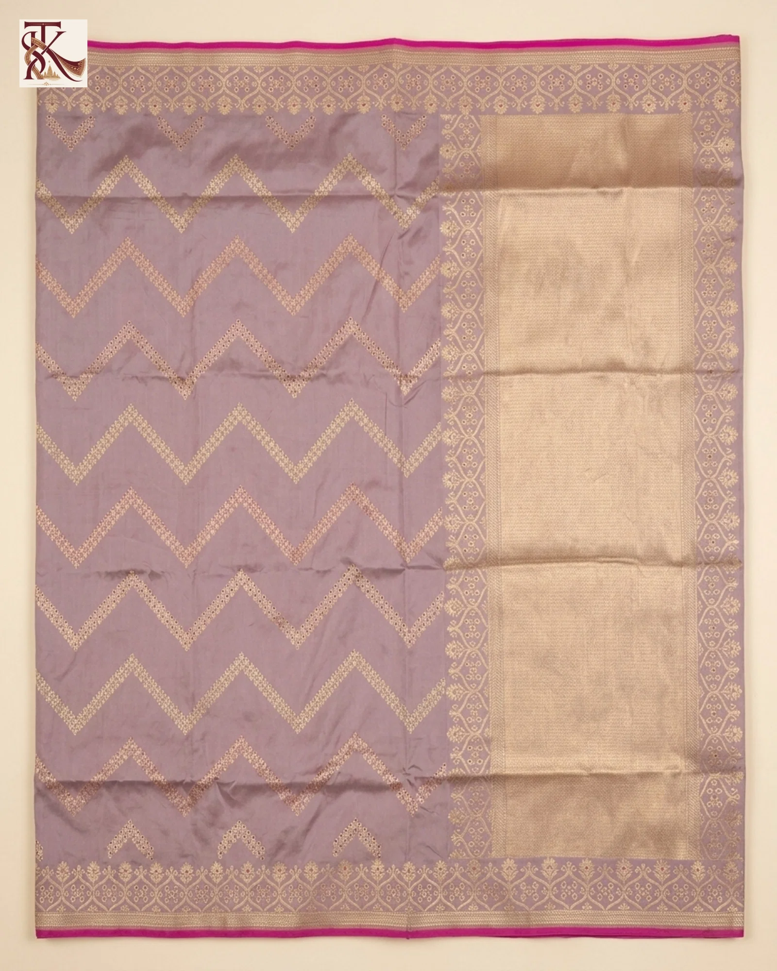 Mauve Pure Katan Silk Kadwa Banarasi saree laid out showing chevron body motifs, magenta edging, border and pallu